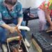 Concurso de pelado de mandioca en el Mercado Concentrador