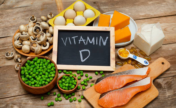 Foods rich in vitamin D on a wooden table